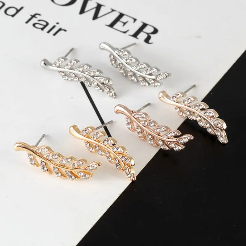 Fashion Symmetrical Hollow Leaves Stud Earrings