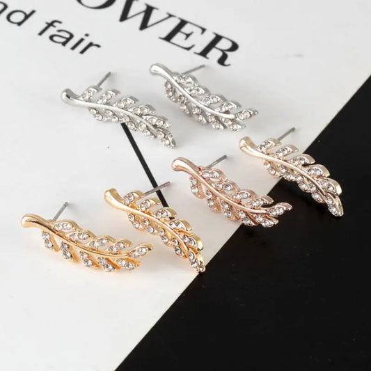 Fashion Symmetrical Hollow Leaves Stud Earrings