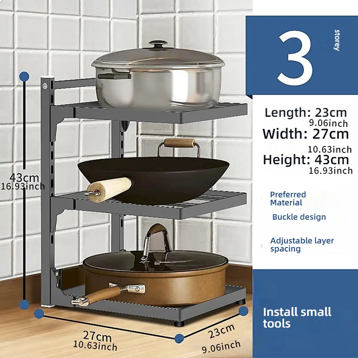 Three-tier kitchen storage rack with pots and pans on a tiled wall background