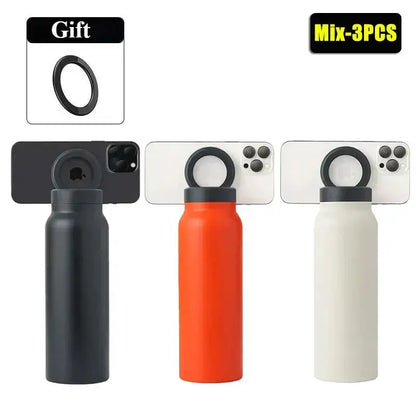 Three metal bottles with camera lens protectors on a white background
